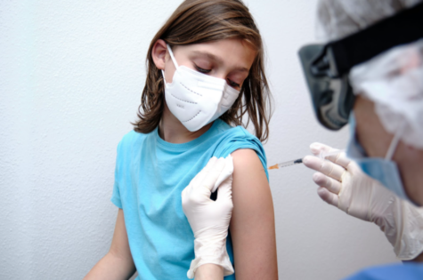 Children start to get the vaccine to help fight against new variants of COVID-19.