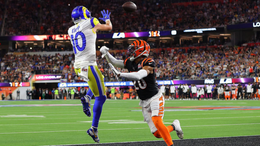 Pictured is Super Bowl LVI MVP Cooper Kupp (left) about to catch the game clinching touchdown over Eli Apple (Right)