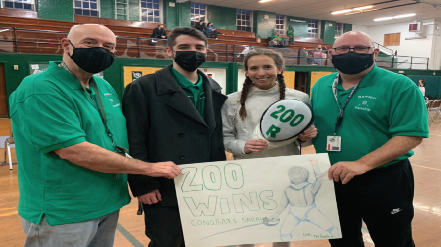 Sarah and her coaches celebrating her 200th win. 
Photo Courtesy of Ramapo Girls Fencing Team 