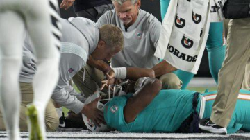 During week 4 of the NFL games, the Miami Dolphins were scheduled to play the Cincinnati Bengals for Thursday Night football. On September 29th, Tua Tagovailoa was wheeled off of the field after being taken down by the opposing team player, Josh Tupou. The well known quarterback, a University of Alabama alumni, was diagnosed with a horrific concussion almost immediately after the collision. He appears to experience  whiplash and fails to get up from the ground. Tagovailoa was sent to a local hospital in Cincinnati where the doctors and specialists, went over the routine NFL concussion protocol; he was cleared soon after. Tua was then told that he could fly back home with his team Friday morning. 


Tua Tagovailoa after being hit by Josh Tupou during week 4 of the NFL, visibly in physical distress  (CNN.com). 

Head coach, Mike McDaniel, handled the brunt of interviews withholding this situation. According to ESPN, McDaniel informs, “Right now he is in the building. Hes had a couple good days, but hes just trying to go through with the proper procedure and protocol so that hes feeling 100 percent, (ESPN.com). This was said when his fans and teammates were waiting for Tua to return to the field. However, he had not been back for two weeks, which sparked a lot of controversy in fans. Ramapo teacher, Mr.
Wadhams, claims  “I think that they care more about making a profit then anything else.” 
People started looking back at his latest game and noticed another fall during week 3. Tagovailoa was hit during a game against the Buffalo Bills. He is seen being hit by  defender, Matt Milano; as he gets up, Tua stumbles returning to form a new play. This is very concerning considering after having a fall, one should not experience difficulty walking. The athletic directors brought him to the locker room to perform a procedure in which he was cleared to play the rest of the game. What started conflicts, was how quickly Tagovailoa was given the “ok”.. When an event like this happens it is mandatory that a neuro trauma expert inspects the player. In Tua’s case, this did not occur.. Therefore, he returned to finish the game which ended in a win. 
When asking Ramapo junior, Courtney Collins, about these injuries and their effects, she was very passionate about her answer: “He should have been immediately taken off and not put back on to continue the game. I have dealt with an injury before and all you want to do is return to the field to help the team, but your safety is truly what comes first.” 

Tua Tagovailoa is seen stumbling when returning back to the line of scrimmage (Highlight Heaven - Youtube). 
Since Tagovailoa was cleared,after an apparent back injury that was handled as a concussion, he suffered from neurological and spinal damage. Moreover, the NFl continues to preach that they care about player safety, but when you look at how they handle these types of situations, is this really true?
