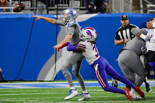 Damar Hamlin, safety for the Buffalo Bills, tackling Jared Goff, quarterback of the Detroit Lions 