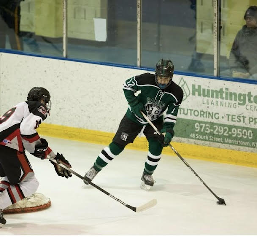 Mauriber repping green and white while on the ice 