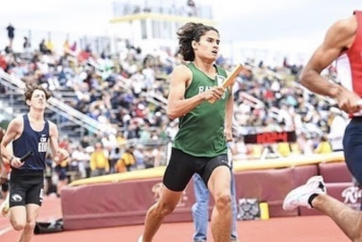 DiVincent running in the 4x800m relay at the State Meet of Champions 