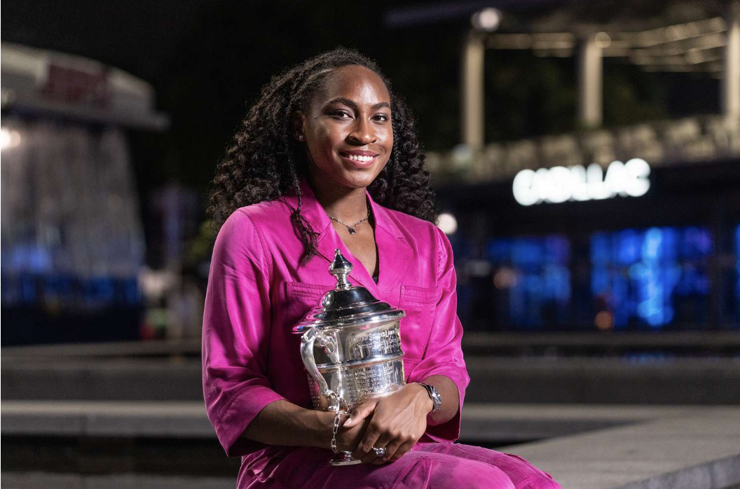 Coco Gauff holding the U.S. Open trophy after her 2023 win