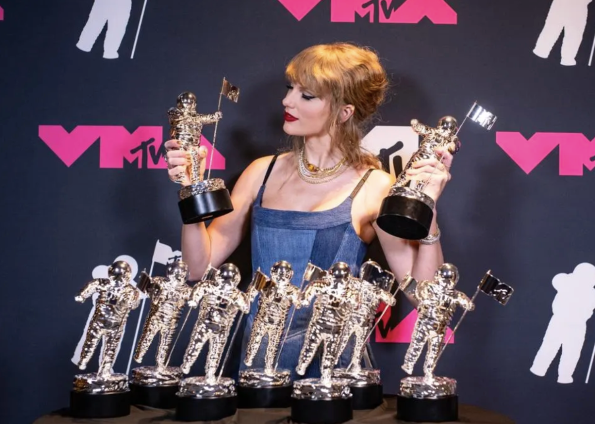 Taylor Swift photographed with her 9 VMA awards