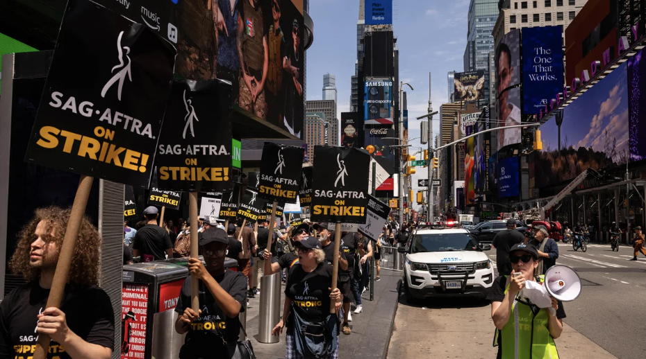 SAG-AFTRA members and supporters on a picket line in Times Square, NY