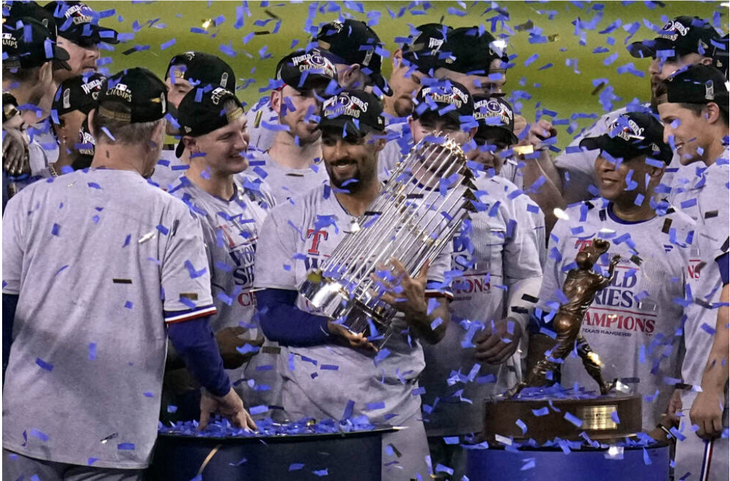 Marcus Semien (center) and the Texas Rangers celebrating their World Series win.