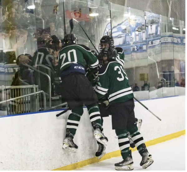 Ramapo Boys Hockey after scoring a goal to get them in the lead during the Ridge game