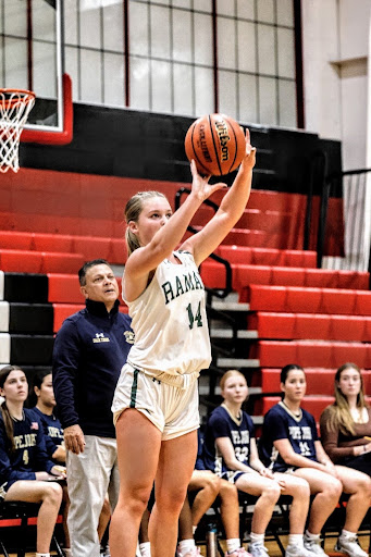 Gmiterek attempting a 3-pointer in a game against Pope John Regional High School in the Westwood Tournament Championship 
