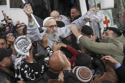 Palestinian prisoners released under the ceasefire deal are welcomed home in the West Bank by massive crowds. (AP News)
