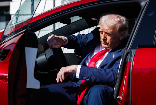 Donald Trump sitting inside a Tesla Model S on the White House lawn (ABC News)
